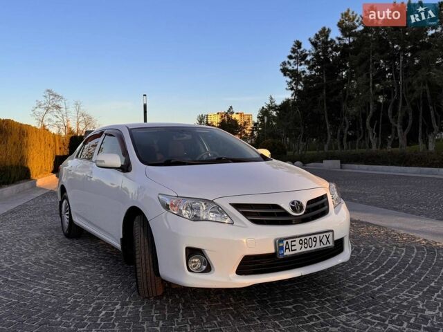Білий Тойота Королла, об'ємом двигуна 1.3 л та пробігом 232 тис. км за 8450 $, фото 1 на Automoto.ua
