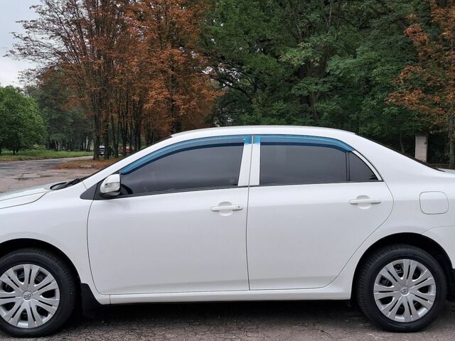 Білий Тойота Королла, об'ємом двигуна 1.6 л та пробігом 118 тис. км за 8900 $, фото 1 на Automoto.ua
