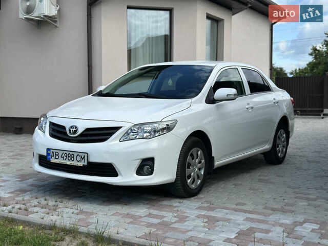 Білий Тойота Королла, об'ємом двигуна 1.3 л та пробігом 152 тис. км за 7300 $, фото 1 на Automoto.ua