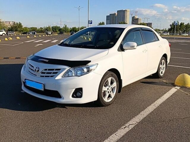 Белый Тойота Королла, объемом двигателя 1.6 л и пробегом 178 тыс. км за 9300 $, фото 1 на Automoto.ua