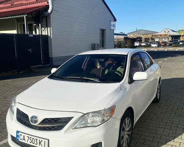 Белый Тойота Королла, объемом двигателя 1.8 л и пробегом 220 тыс. км за 7999 $, фото 1 на Automoto.ua