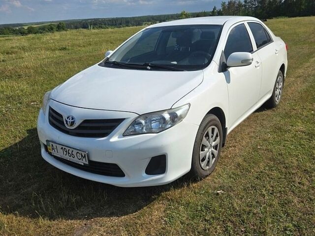 Белый Тойота Королла, объемом двигателя 1.33 л и пробегом 303 тыс. км за 6500 $, фото 1 на Automoto.ua