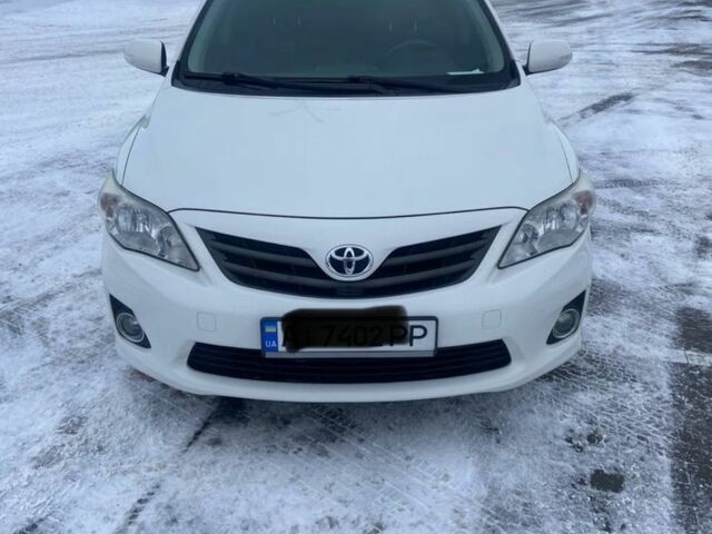 Білий Тойота Королла, об'ємом двигуна 1.6 л та пробігом 178 тис. км за 9200 $, фото 1 на Automoto.ua