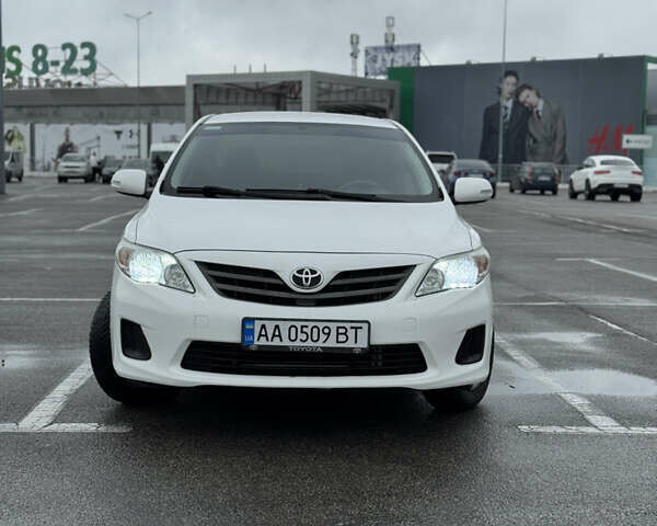 Белый Тойота Королла, объемом двигателя 1.33 л и пробегом 233 тыс. км за 7200 $, фото 1 на Automoto.ua