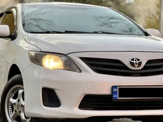 Білий Тойота Королла, об'ємом двигуна 1.33 л та пробігом 285 тис. км за 6500 $, фото 1 на Automoto.ua