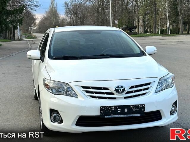 Білий Тойота Королла, об'ємом двигуна 1.6 л та пробігом 88 тис. км за 9300 $, фото 1 на Automoto.ua