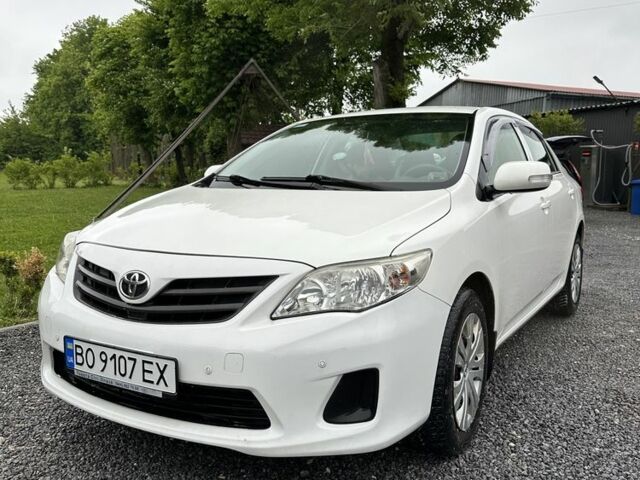Білий Тойота Королла, об'ємом двигуна 1.6 л та пробігом 148 тис. км за 8200 $, фото 1 на Automoto.ua