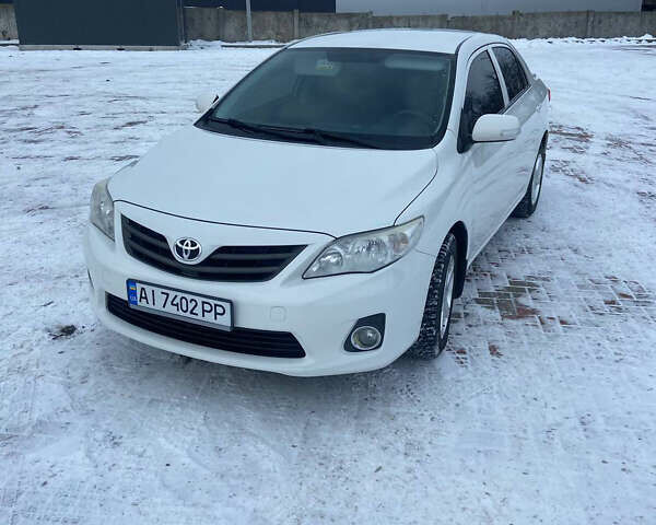 Білий Тойота Королла, об'ємом двигуна 1.6 л та пробігом 178 тис. км за 9200 $, фото 1 на Automoto.ua