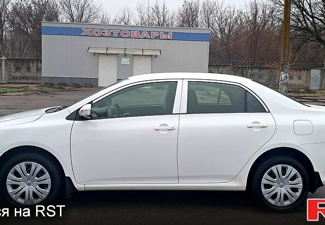 Белый Тойота Королла, объемом двигателя 1.6 л и пробегом 83 тыс. км за 9300 $, фото 1 на Automoto.ua