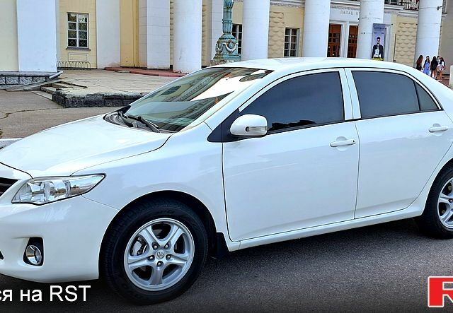 Белый Тойота Королла, объемом двигателя 1.6 л и пробегом 83 тыс. км за 9300 $, фото 1 на Automoto.ua
