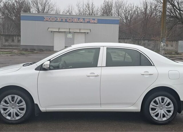 Белый Тойота Королла, объемом двигателя 1.6 л и пробегом 83 тыс. км за 9300 $, фото 1 на Automoto.ua