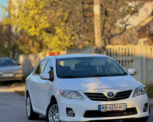 Белый Тойота Королла, объемом двигателя 1.33 л и пробегом 220 тыс. км за 6500 $, фото 1 на Automoto.ua