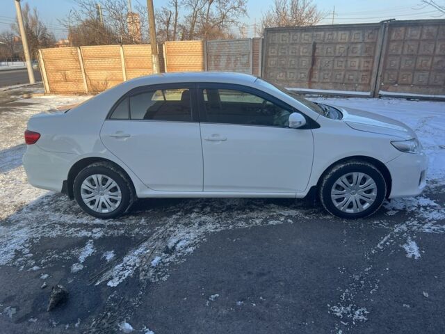 Білий Тойота Королла, об'ємом двигуна 1.6 л та пробігом 226 тис. км за 9021 $, фото 1 на Automoto.ua