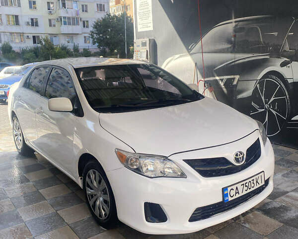 Белый Тойота Королла, объемом двигателя 1.8 л и пробегом 219 тыс. км за 7999 $, фото 1 на Automoto.ua