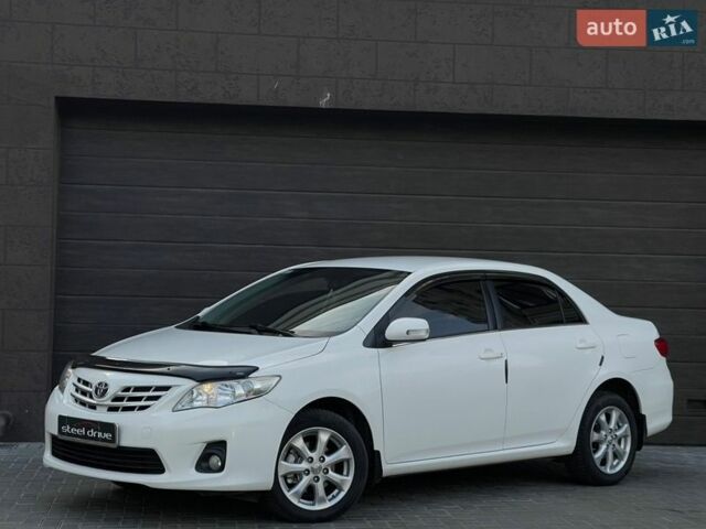 Белый Тойота Королла, объемом двигателя 1.6 л и пробегом 193 тыс. км за 10999 $, фото 1 на Automoto.ua