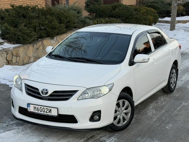 Белый Тойота Королла, объемом двигателя 1.3 л и пробегом 145 тыс. км за 6700 $, фото 1 на Automoto.ua