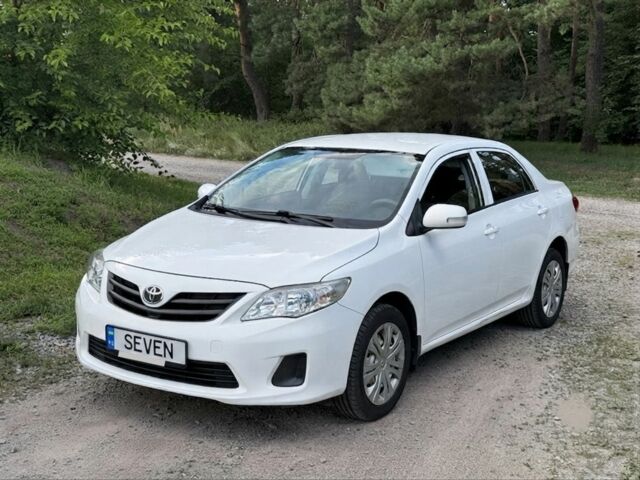 Білий Тойота Королла, об'ємом двигуна 1.6 л та пробігом 191 тис. км за 8293 $, фото 1 на Automoto.ua