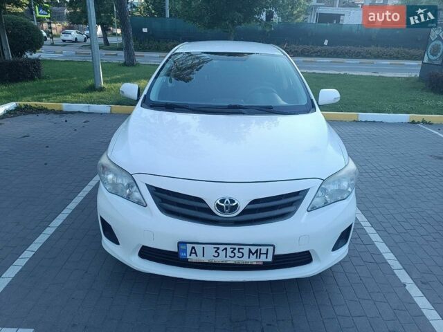 Белый Тойота Королла, объемом двигателя 1.6 л и пробегом 336 тыс. км за 7500 $, фото 1 на Automoto.ua