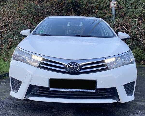 Белый Тойота Королла, объемом двигателя 1.33 л и пробегом 148 тыс. км за 11600 $, фото 1 на Automoto.ua
