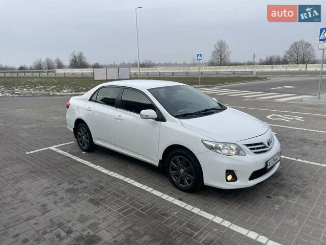 Білий Тойота Королла, об'ємом двигуна 1.6 л та пробігом 141 тис. км за 9800 $, фото 1 на Automoto.ua