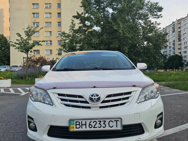Білий Тойота Королла, об'ємом двигуна 1.4 л та пробігом 130 тис. км за 9201 $, фото 1 на Automoto.ua