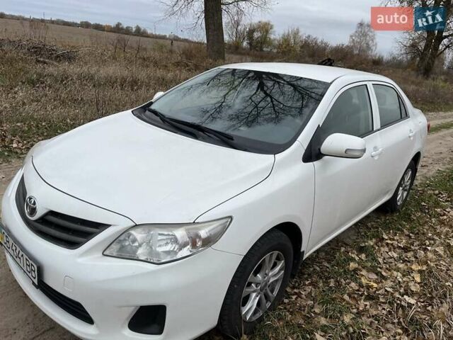 Белый Тойота Королла, объемом двигателя 1.33 л и пробегом 246 тыс. км за 9000 $, фото 1 на Automoto.ua