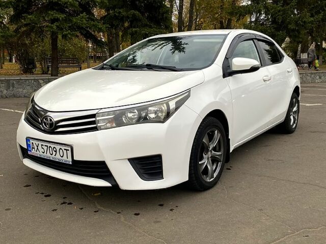 Білий Тойота Королла, об'ємом двигуна 1.6 л та пробігом 200 тис. км за 8800 $, фото 1 на Automoto.ua
