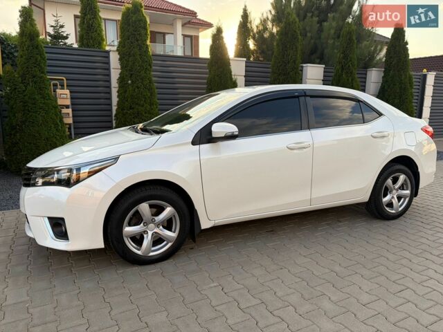 Білий Тойота Королла, об'ємом двигуна 1.6 л та пробігом 142 тис. км за 11700 $, фото 1 на Automoto.ua