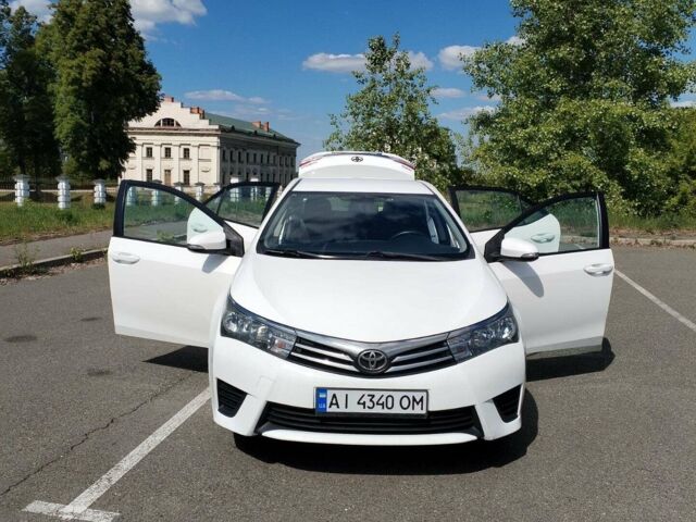 Білий Тойота Королла, об'ємом двигуна 1.6 л та пробігом 210 тис. км за 10800 $, фото 1 на Automoto.ua