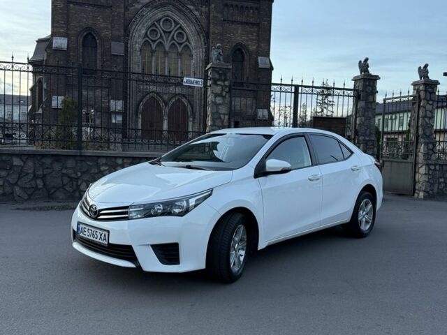Білий Тойота Королла, об'ємом двигуна 1.6 л та пробігом 180 тис. км за 12599 $, фото 1 на Automoto.ua