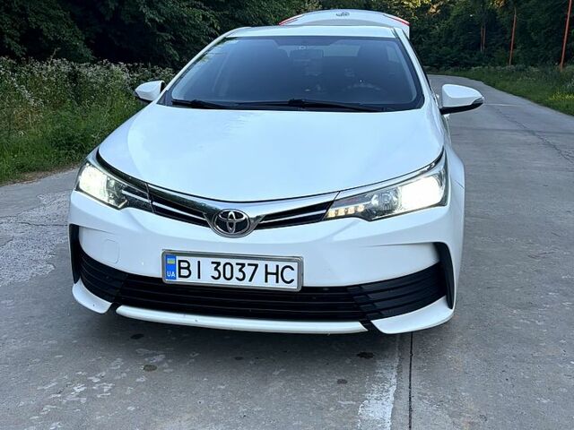 Білий Тойота Королла, об'ємом двигуна 1.3 л та пробігом 121 тис. км за 11500 $, фото 1 на Automoto.ua