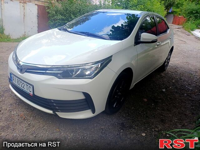 Білий Тойота Королла, об'ємом двигуна 1.6 л та пробігом 149 тис. км за 8900 $, фото 1 на Automoto.ua
