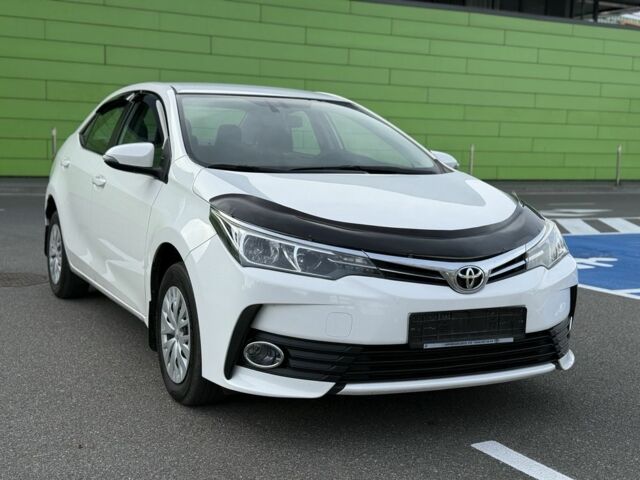 Белый Тойота Королла, объемом двигателя 1.6 л и пробегом 169 тыс. км за 9900 $, фото 1 на Automoto.ua