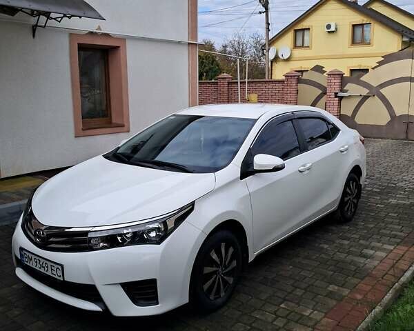 Білий Тойота Королла, об'ємом двигуна 1.33 л та пробігом 27 тис. км за 13500 $, фото 1 на Automoto.ua
