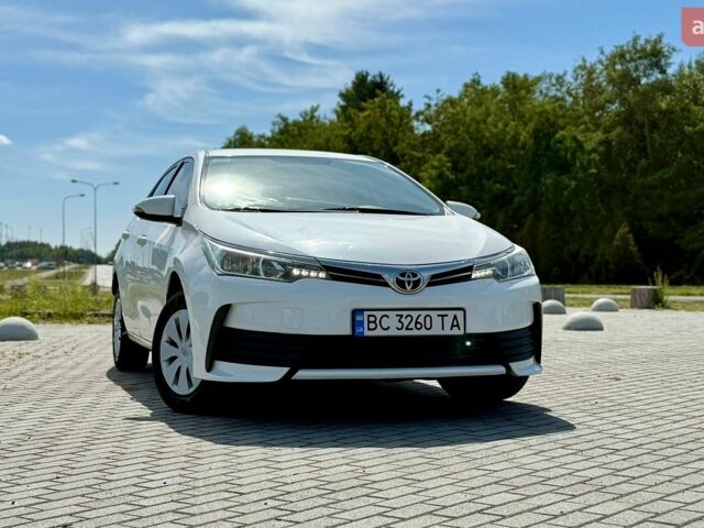 Белый Тойота Королла, объемом двигателя 1.33 л и пробегом 169 тыс. км за 9500 $, фото 1 на Automoto.ua