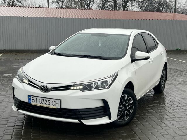 Белый Тойота Королла, объемом двигателя 1.3 л и пробегом 67 тыс. км за 11850 $, фото 1 на Automoto.ua