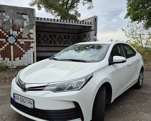 Белый Тойота Королла, объемом двигателя 1.33 л и пробегом 222 тыс. км за 9600 $, фото 1 на Automoto.ua