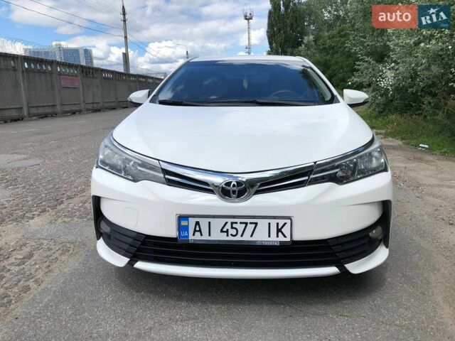Білий Тойота Королла, об'ємом двигуна 1.6 л та пробігом 206 тис. км за 9600 $, фото 1 на Automoto.ua