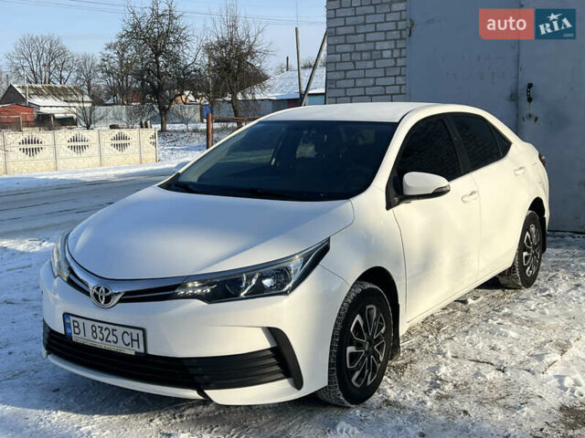 Белый Тойота Королла, объемом двигателя 1.33 л и пробегом 67 тыс. км за 11500 $, фото 1 на Automoto.ua