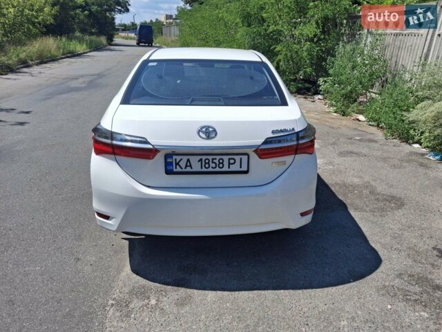 Белый Тойота Королла, объемом двигателя 1.6 л и пробегом 102 тыс. км за 15500 $, фото 1 на Automoto.ua