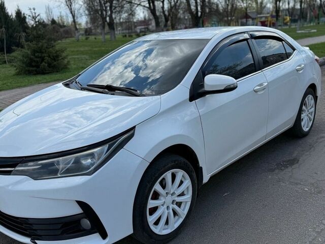 Белый Тойота Королла, объемом двигателя 1.6 л и пробегом 257 тыс. км за 9000 $, фото 1 на Automoto.ua