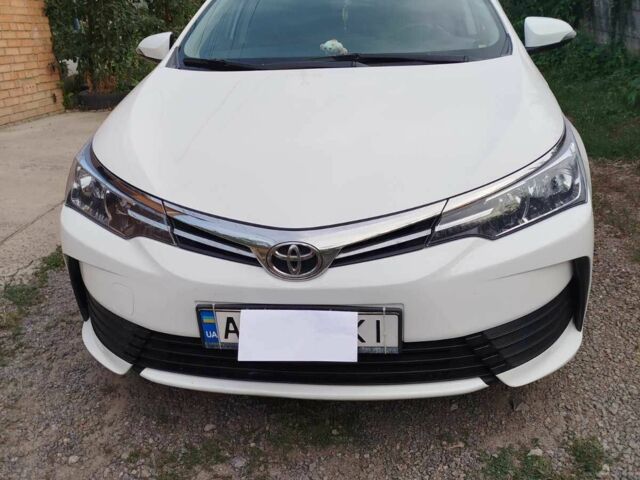 Білий Тойота Королла, об'ємом двигуна 1.33 л та пробігом 262 тис. км за 13051 $, фото 1 на Automoto.ua