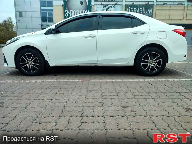 Белый Тойота Королла, объемом двигателя 1.6 л и пробегом 147 тыс. км за 10500 $, фото 1 на Automoto.ua