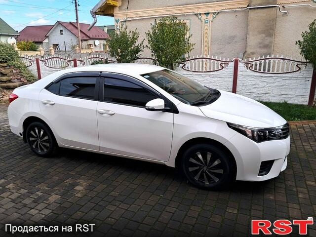 Білий Тойота Королла, об'ємом двигуна 1.3 л та пробігом 26 тис. км за 14600 $, фото 1 на Automoto.ua