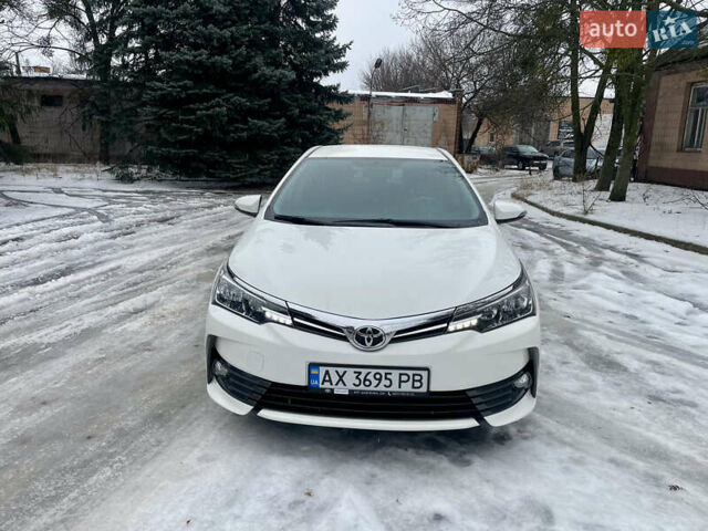 Белый Тойота Королла, объемом двигателя 1.6 л и пробегом 84 тыс. км за 14800 $, фото 1 на Automoto.ua