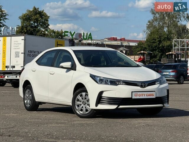 Білий Тойота Королла, об'ємом двигуна 1.6 л та пробігом 151 тис. км за 9899 $, фото 1 на Automoto.ua