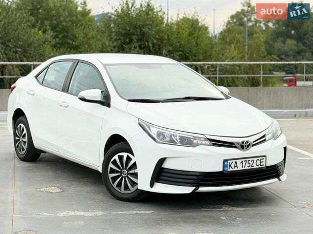 Білий Тойота Королла, об'ємом двигуна 1.6 л та пробігом 183 тис. км за 10700 $, фото 1 на Automoto.ua