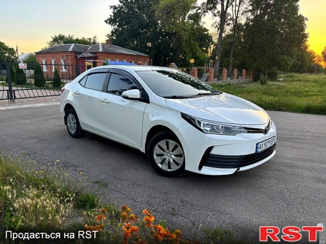 Білий Тойота Королла, об'ємом двигуна 1.3 л та пробігом 191 тис. км за 10300 $, фото 1 на Automoto.ua