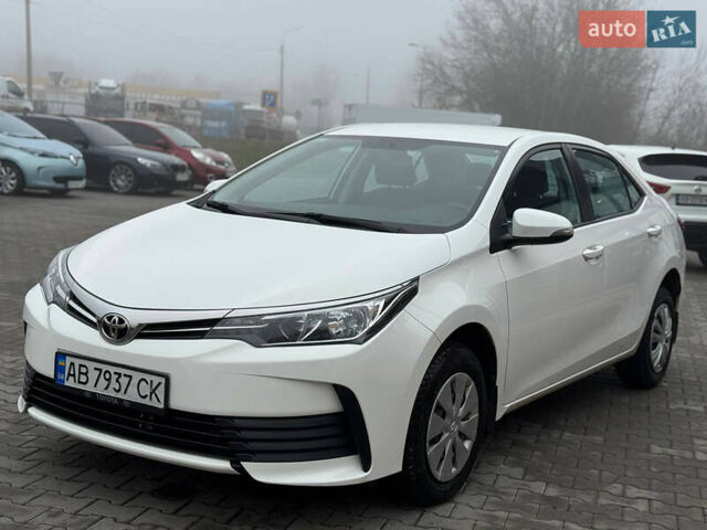 Белый Тойота Королла, объемом двигателя 1.6 л и пробегом 55 тыс. км за 13900 $, фото 1 на Automoto.ua