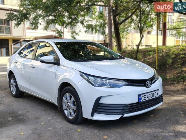 Білий Тойота Королла, об'ємом двигуна 1.33 л та пробігом 130 тис. км за 10800 $, фото 1 на Automoto.ua